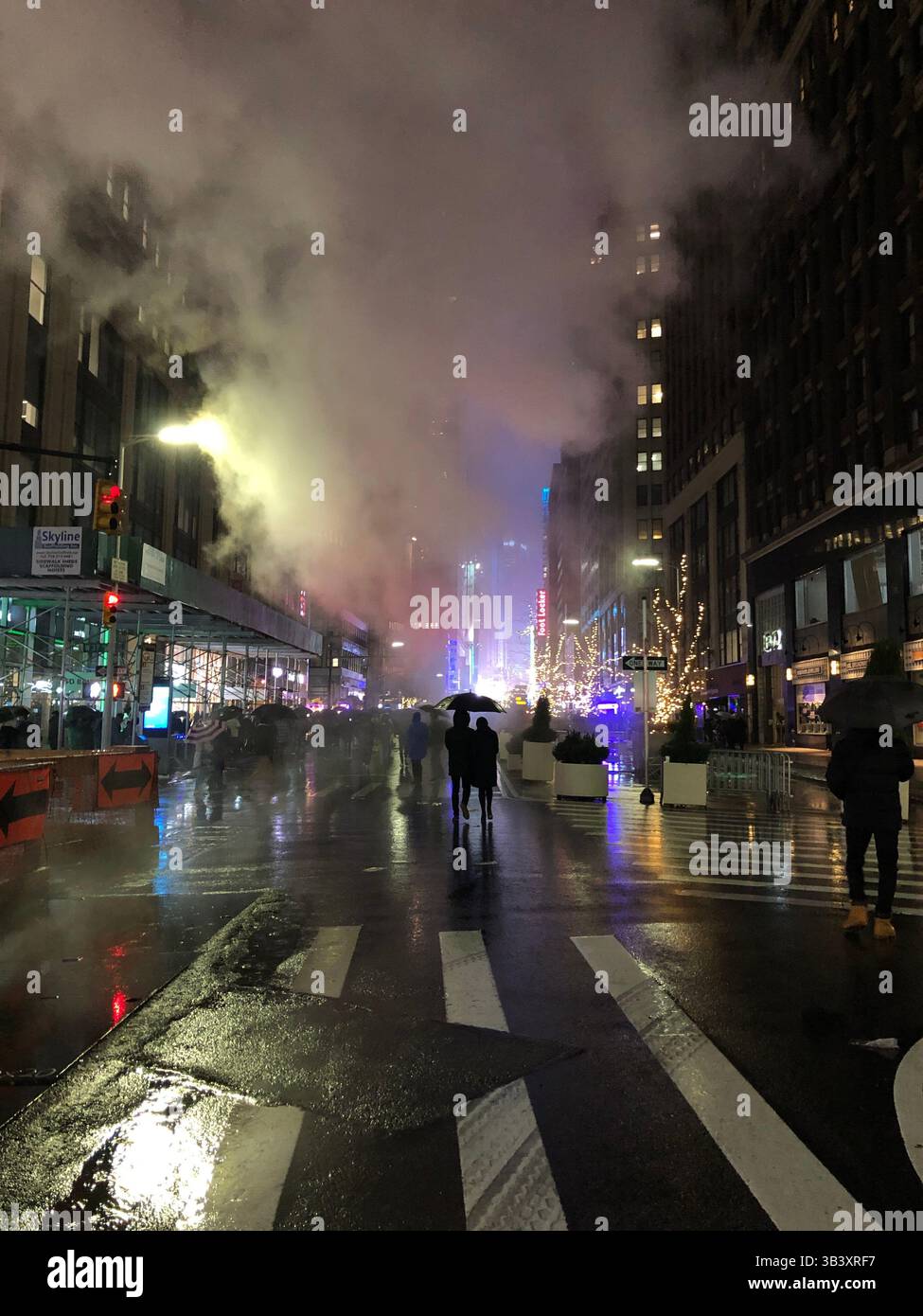 People in Times Square with big city energy, lights, LED signs, popular ...