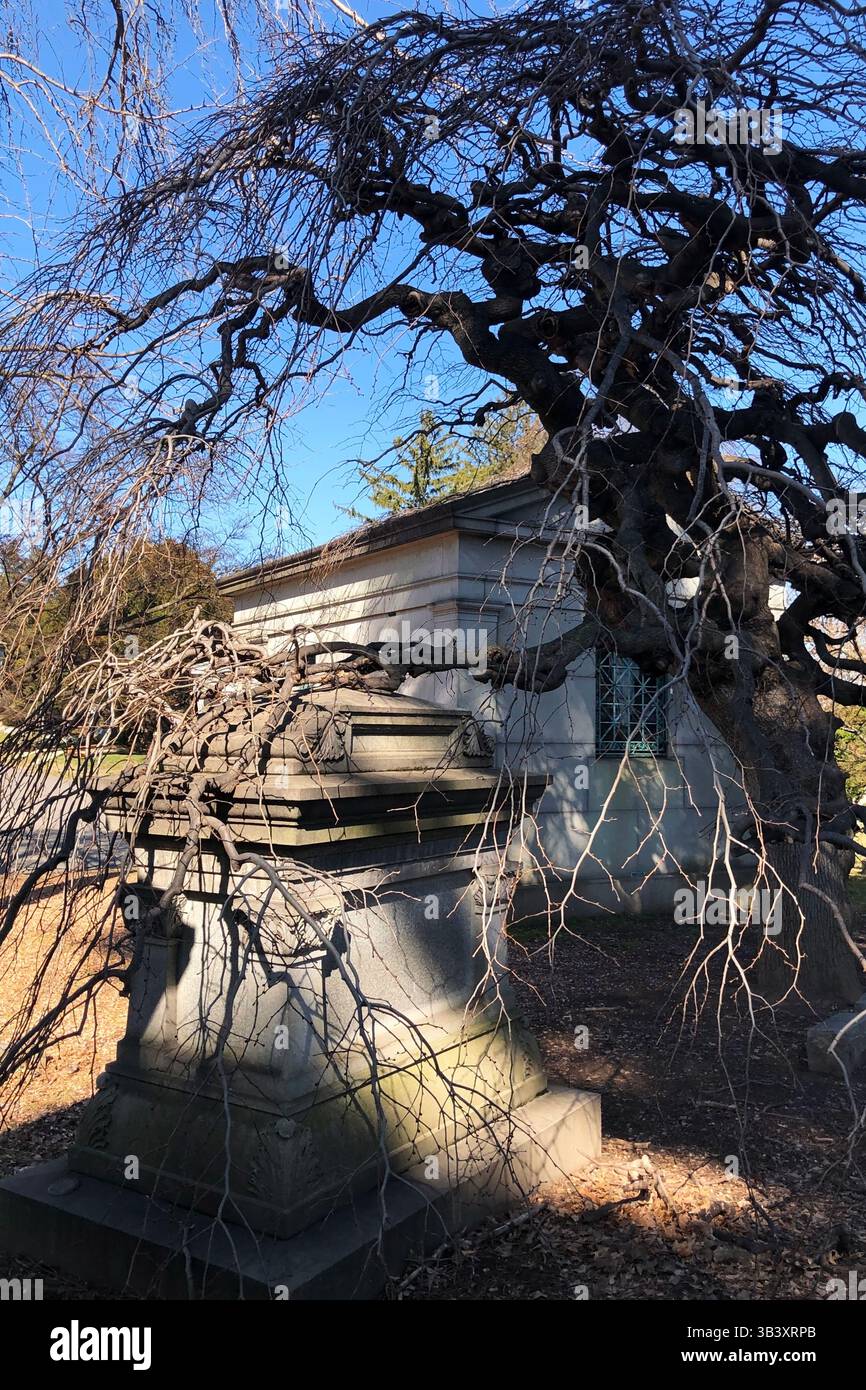 Peaceful historic cemetery with stone mausoleum and decayed tombs Stock ...