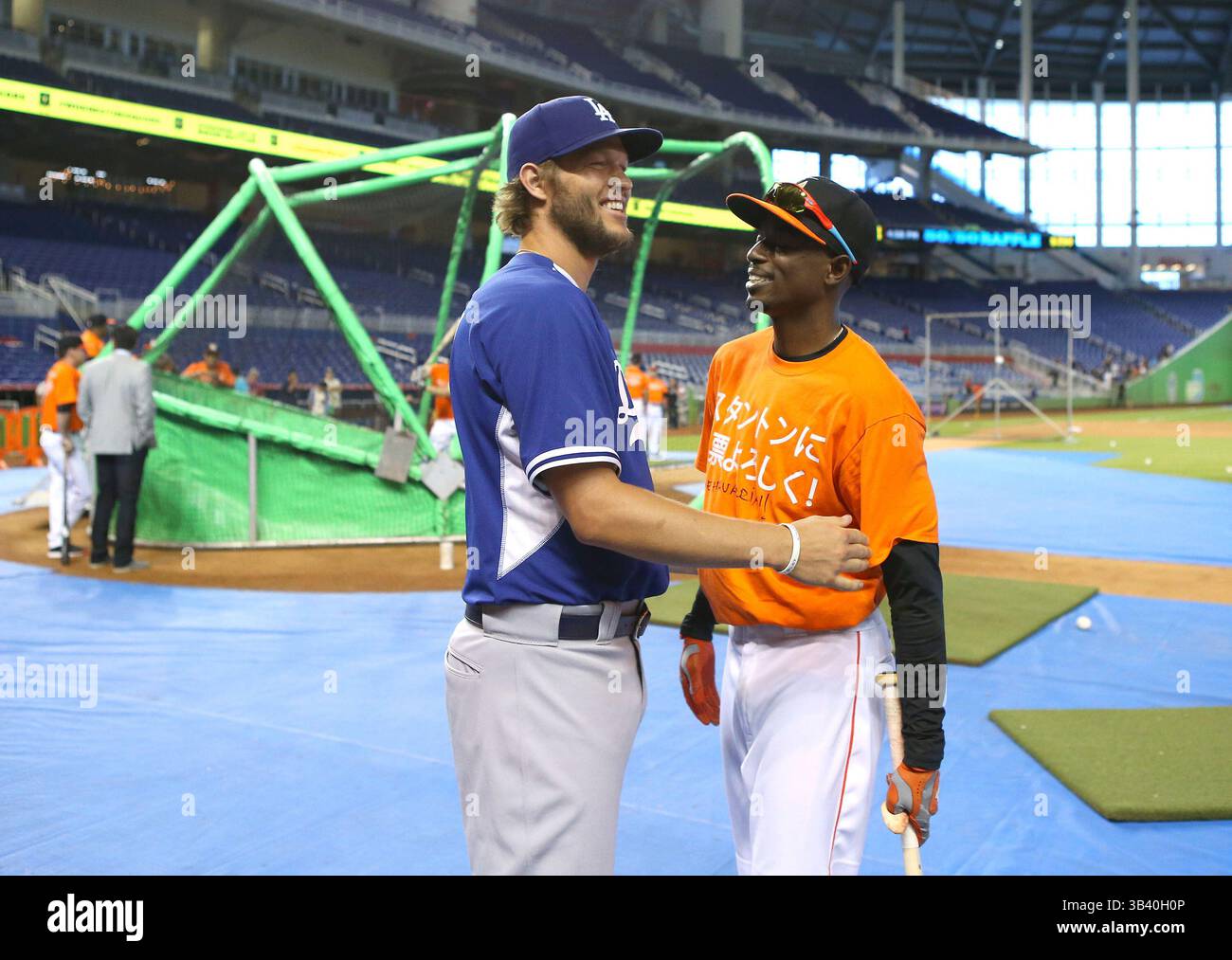 June 26, 2015 - Miami, FL, USA - Los Angeles Dodgers pitcher Clayton Kershaw talks with former teammate Dee Gordon, right, of the Miami Marlins before the start of play at Marlins Park in Miami on Friday, June 26, 2015. (Credit Image: © David Santiago/TNS/ZUMA Wire) Stock Photo