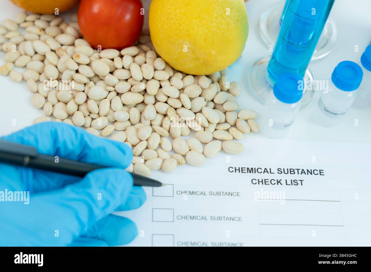 Food quality control experts inspecting hi-res stock photography and ...