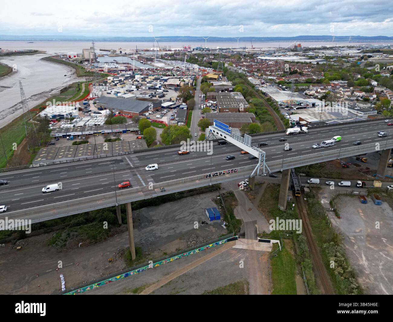 Aerial drone view of M5 Motorway on Avonmouth flyover and Avonmouth Docks, Bristol, UK, April 2025 Stock Photo