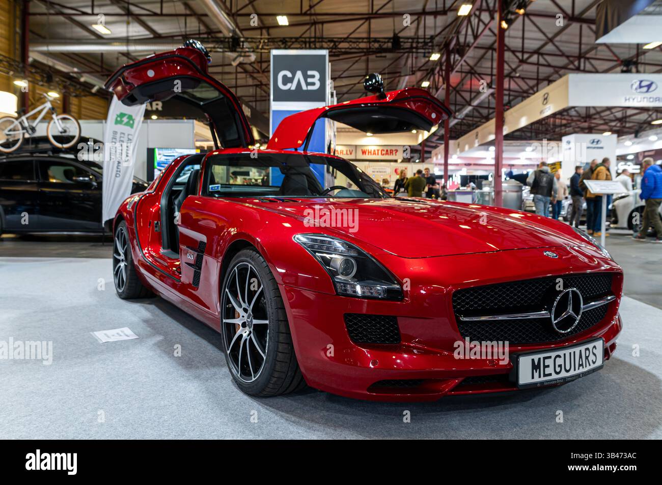 Riga, Latvia - April 25, 2025: A striking red Mercedes sports car ...