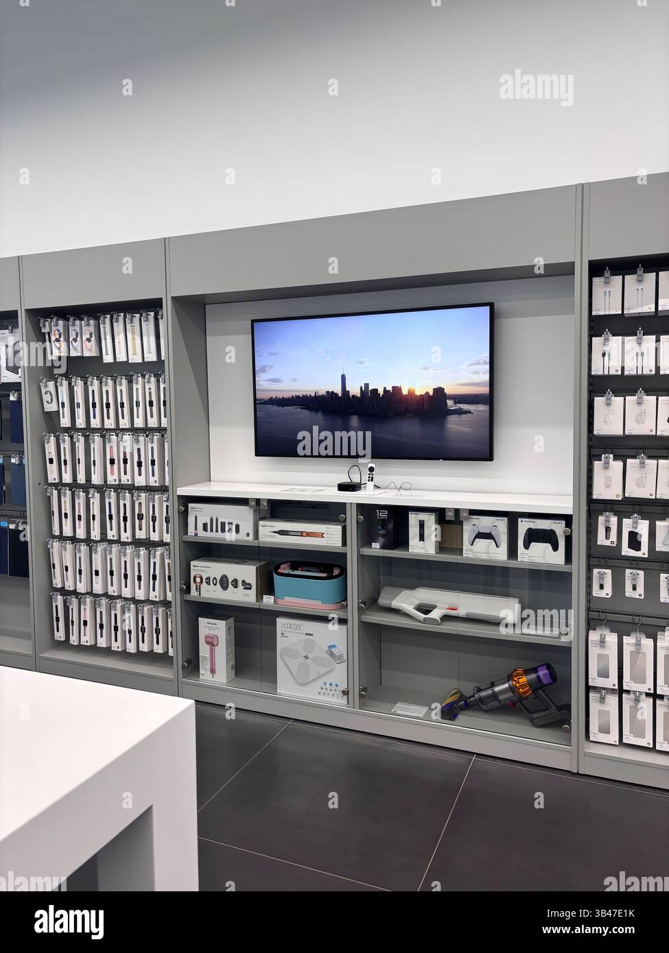 Apple authorized shop. The modern shop with apple products: Iphone, Macbook, Ipad. Phone cases and bracelets Watch Series 10. Kazakhstan, Astana, Octo Stock Photo