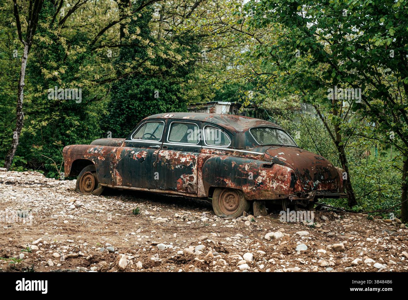 Old rusty car. Abandoned retro vintage car from the 60s. High quality ...