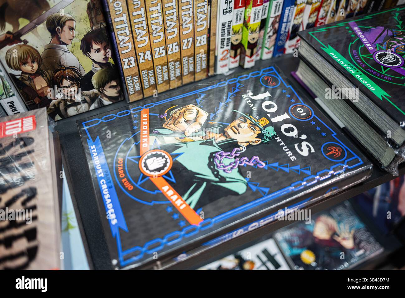 Ivano-Frankivsk, Ukraine - April 29, 2025: A collection of manga books displayed on a shelf showcasing vivid anime artwork Stock Photo