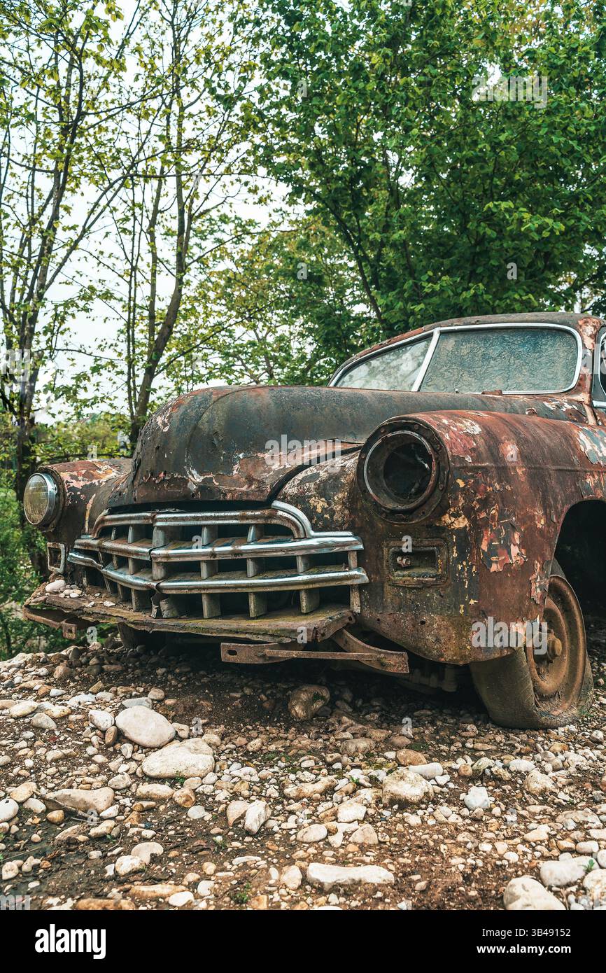 Old rusty car. Abandoned retro vintage car from the 60s. High quality ...