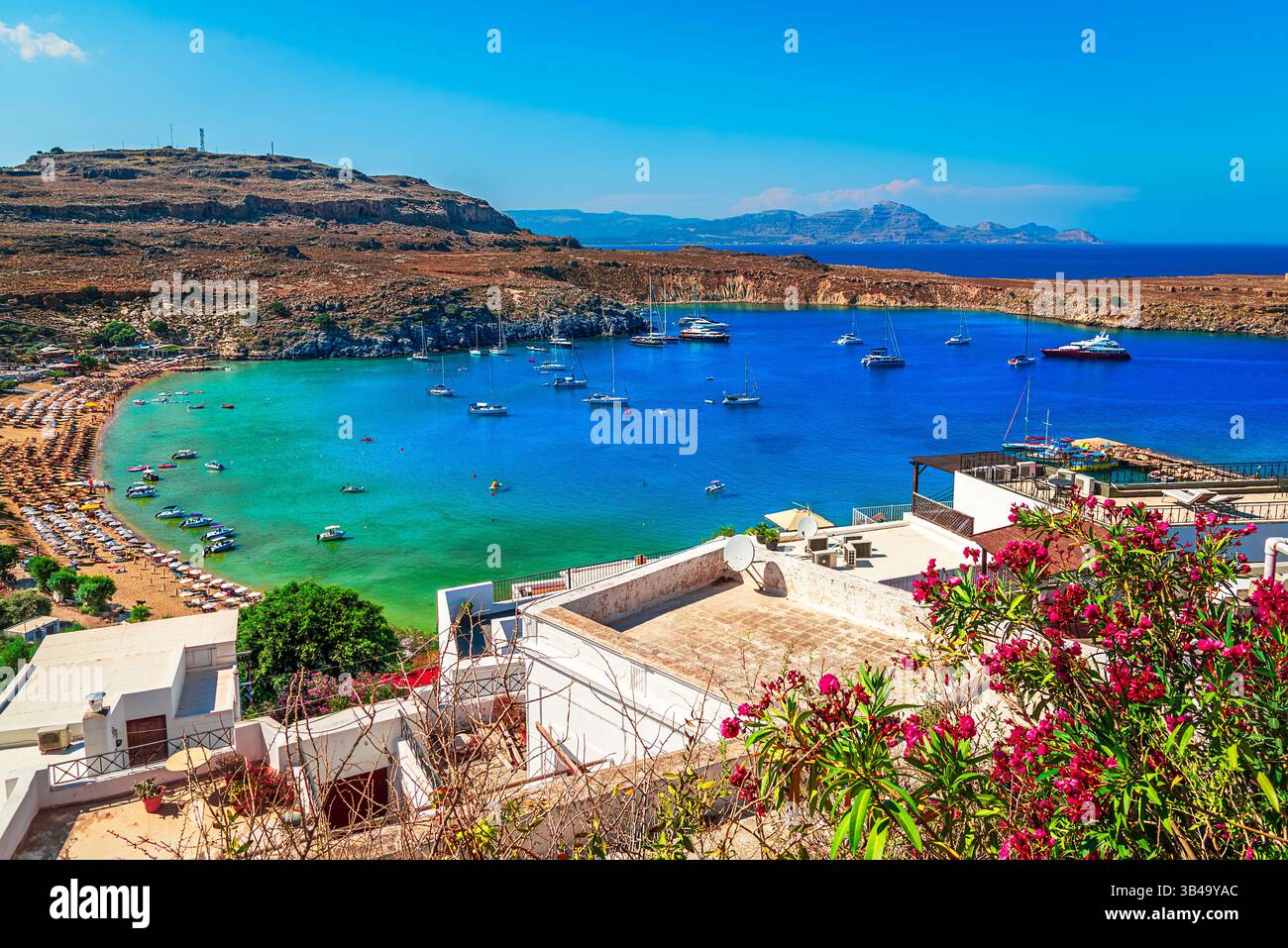 Lindos Rhodwes Lindos, Rhodes, Greece: Scenic view of idyllic Lindos Bay with Clear ...