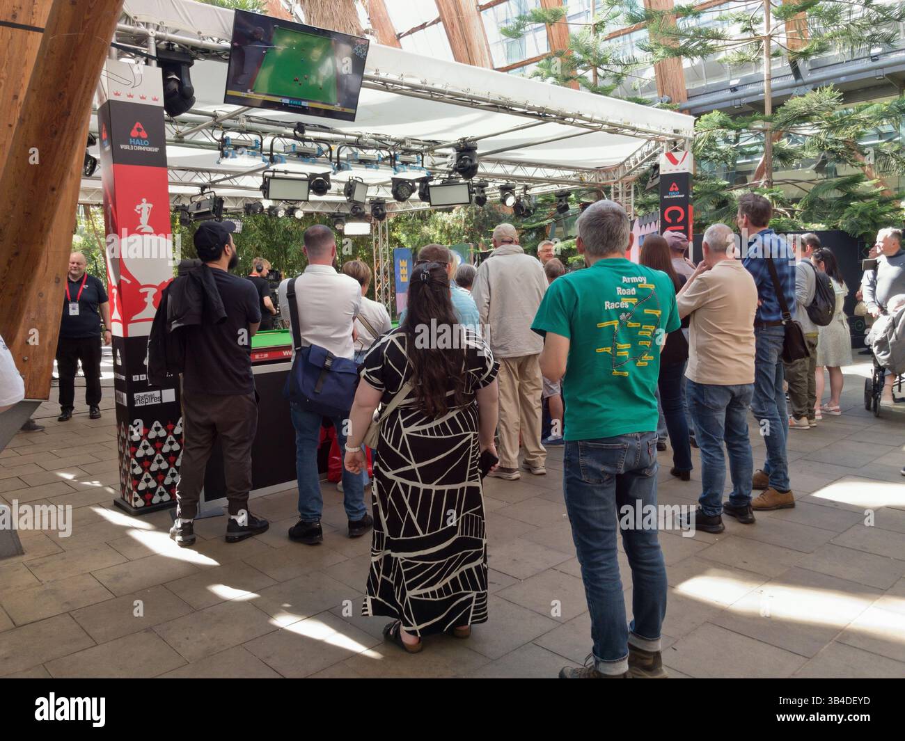 Public crowd in the Sheffield Winter Garden, watching the indoor studio World Championship Snooker, Sports Broadcast, England UK, 2025 - Smartphone Captured Stock Image