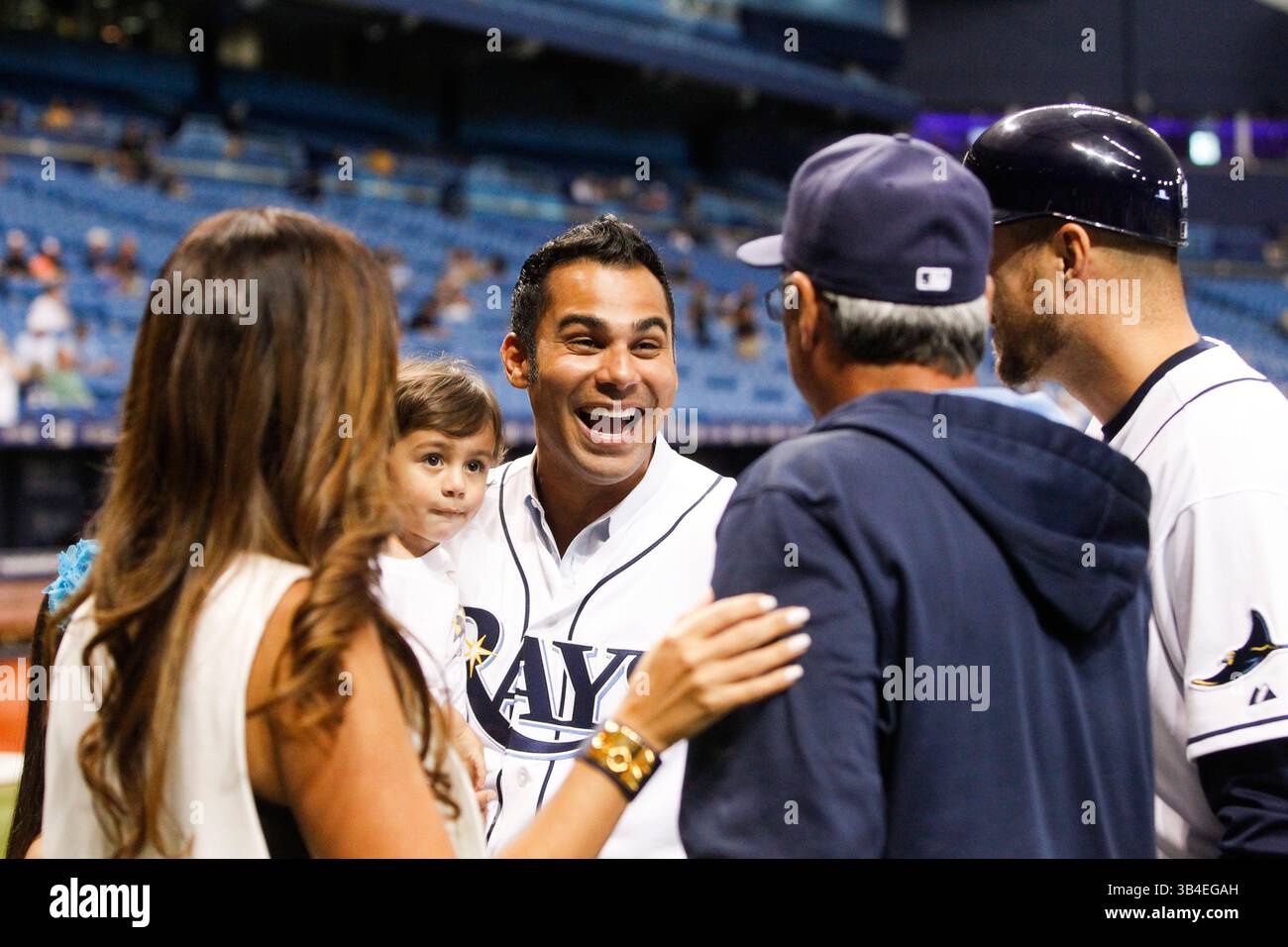 Sept. 18, 2015 - St. Petersburg, Florida, U.S. - WILL VRAGOVIC   |   Times.Former Tampa Bay Ray Carlos Pena with bench coach Tom Foley (6) and first base coach Rocco Baldelli (15) before the start of the game between the Tampa Bay Rays and the Baltimore Orioles in Tropicana Field in St. Petersburg, Fla. on Friday, Sept. 18, 2015. (Credit Image: © Will Vragovic/Tampa Bay Times via ZUMA Wire) Stock Photo