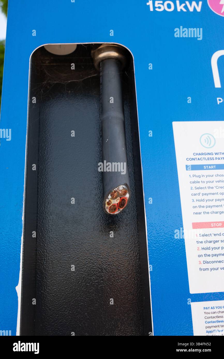 Mer Electric car charging station vandalism and theft of all the electric cables and connectors of three charging stations in Eastleigh Hampshire UK. Stock Photo