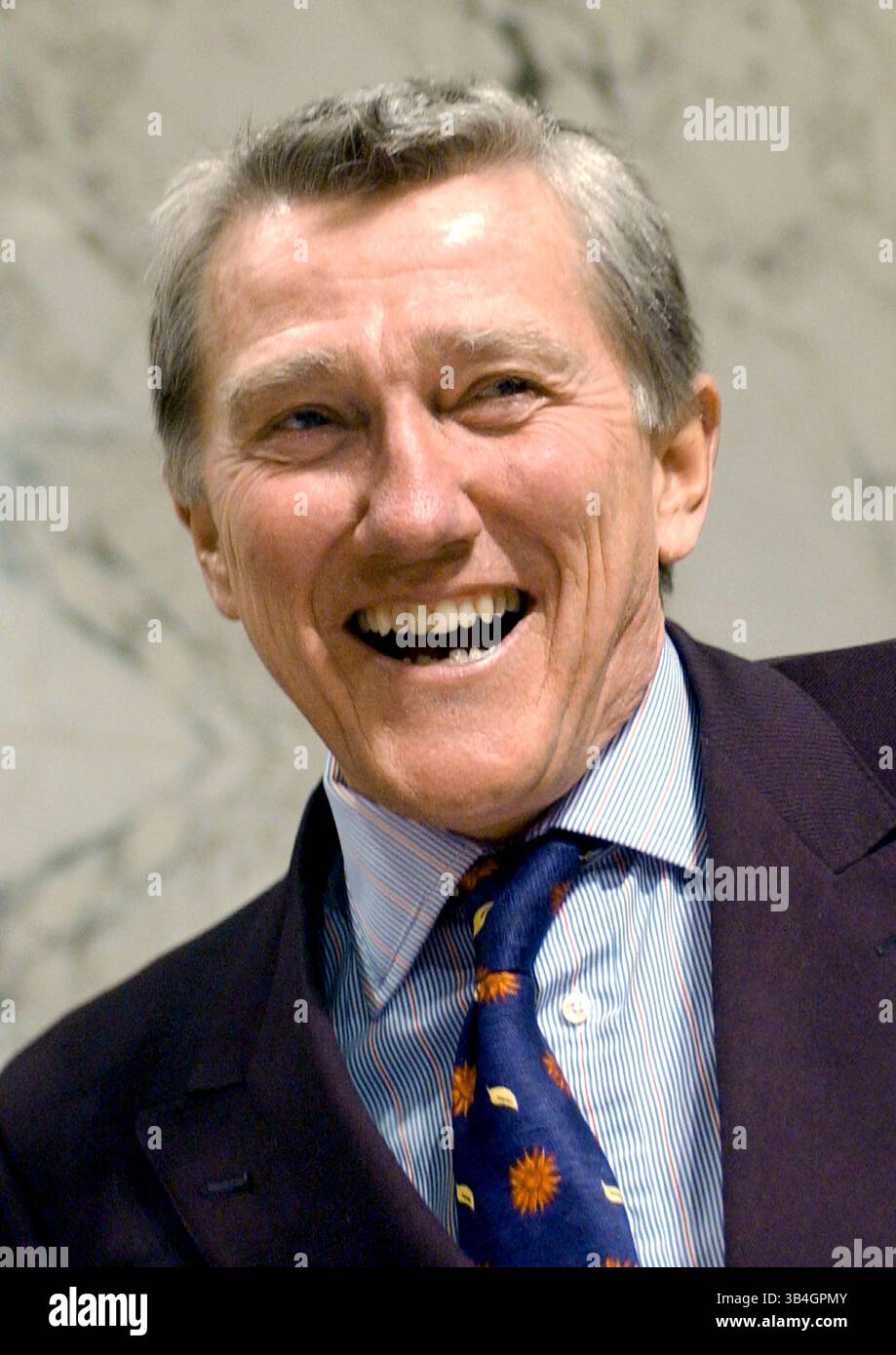 March 24, 2004 - Washington, District of Columbia, United States of America - Washington, D.C. - March 24, 2004 -- Former United States Navy Secretary John F. Lehman, member, The National Commission on Terrorist Attacks Upon the United States (the 9-11 Commission), shares a laugh with the photographers prior to hearing the testimony of Richard A. Clarke in Washington, D.C. on March 24, 2004..Credit: Ron Sachs / CNP.[RESTRICTION: No New York Metro or other Newspapers within a 75 mile radius of New York City] (Credit Image: © Ron Sachs/CNP via ZUMA Wire) Stock Photo