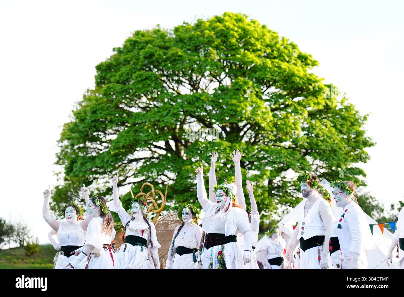 Performers prepare to take part in the Beltane Fire Festival in ...
