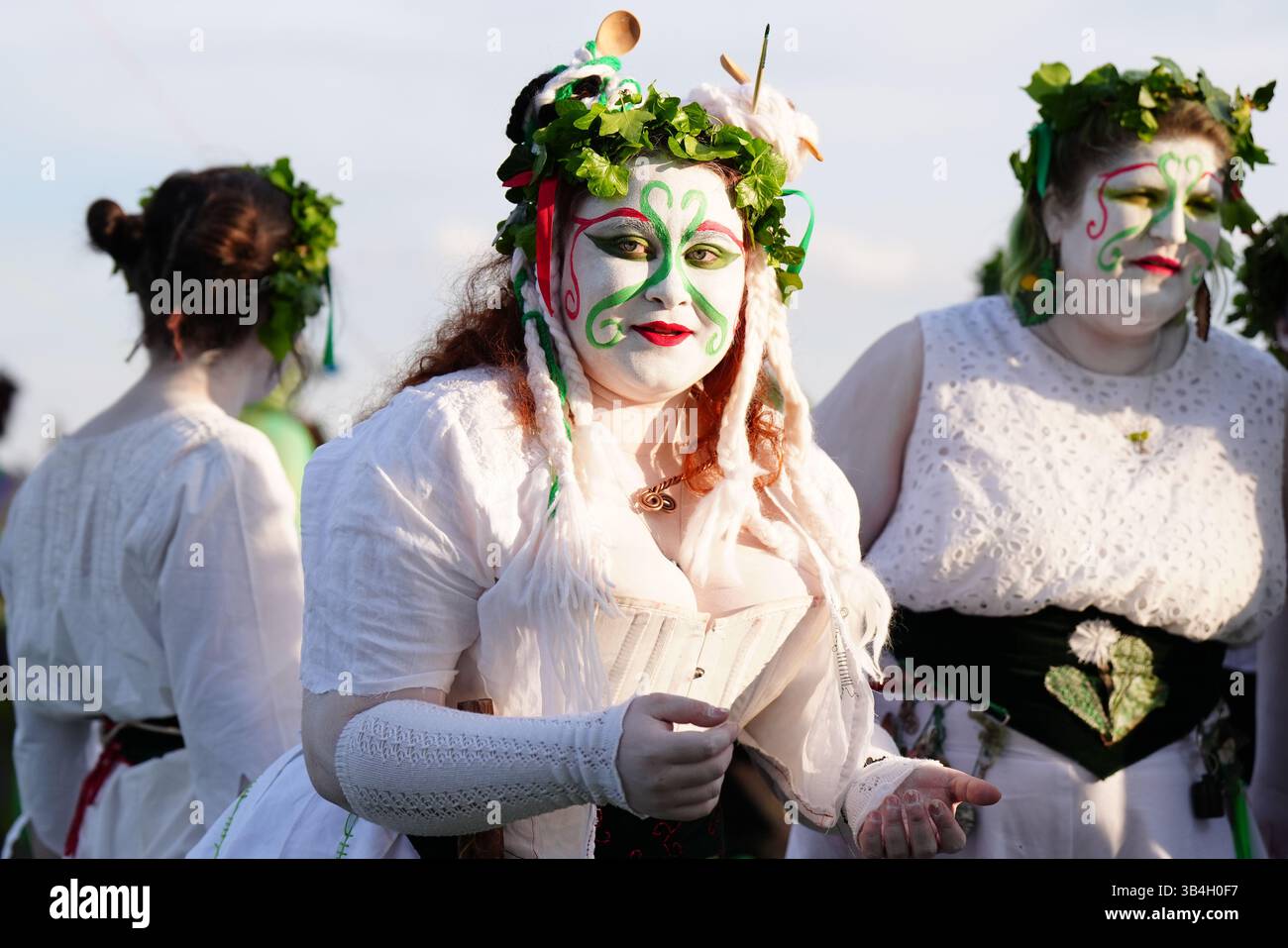 Performers prepare to take part in the Beltane Fire Festival in ...
