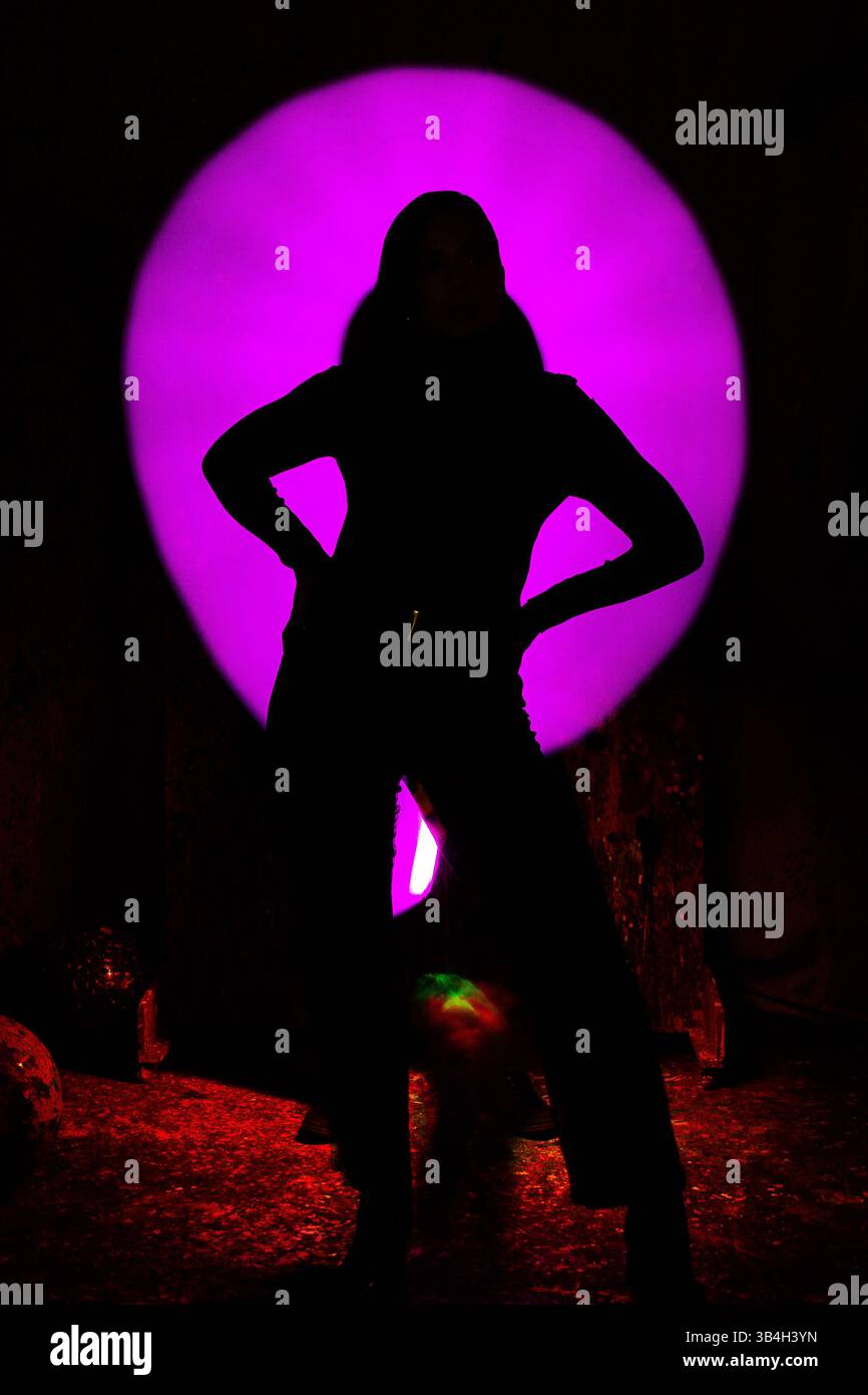 Silhouette with Vivid Pink Light – Artistic Portrait in Studio Setting, Alphaville-SP Stock Photo