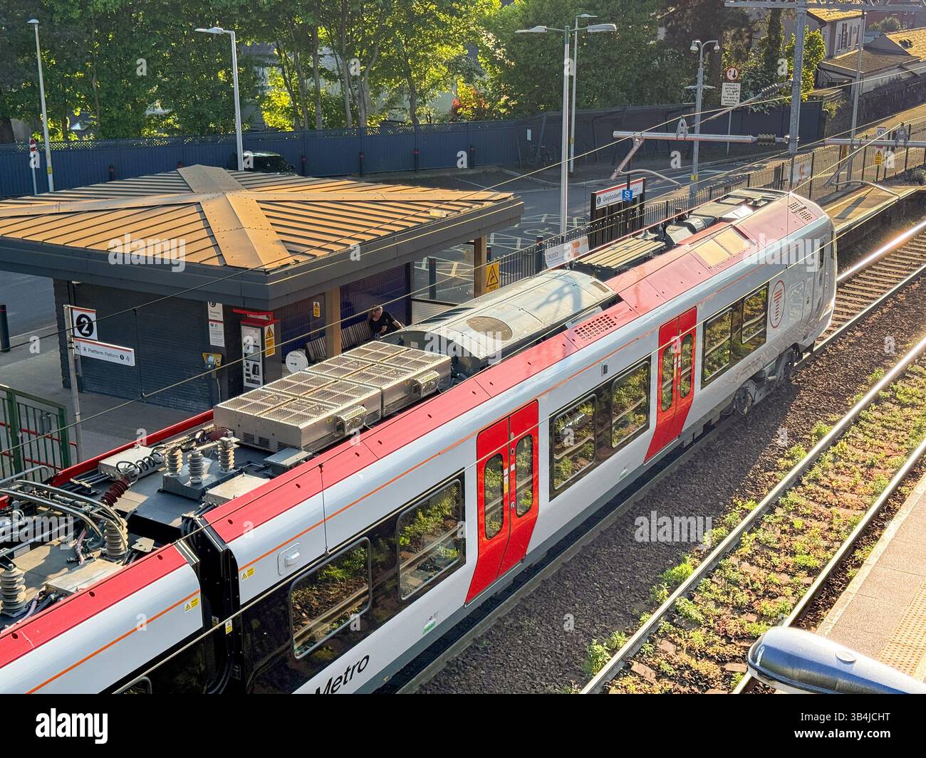 Cardiff, Wales, UK - 29 April 2025: Class 756 commuter train at Llandaff North railway station. The locomotive was built for Transport for Wales. - Smartphone Captured Stock Image