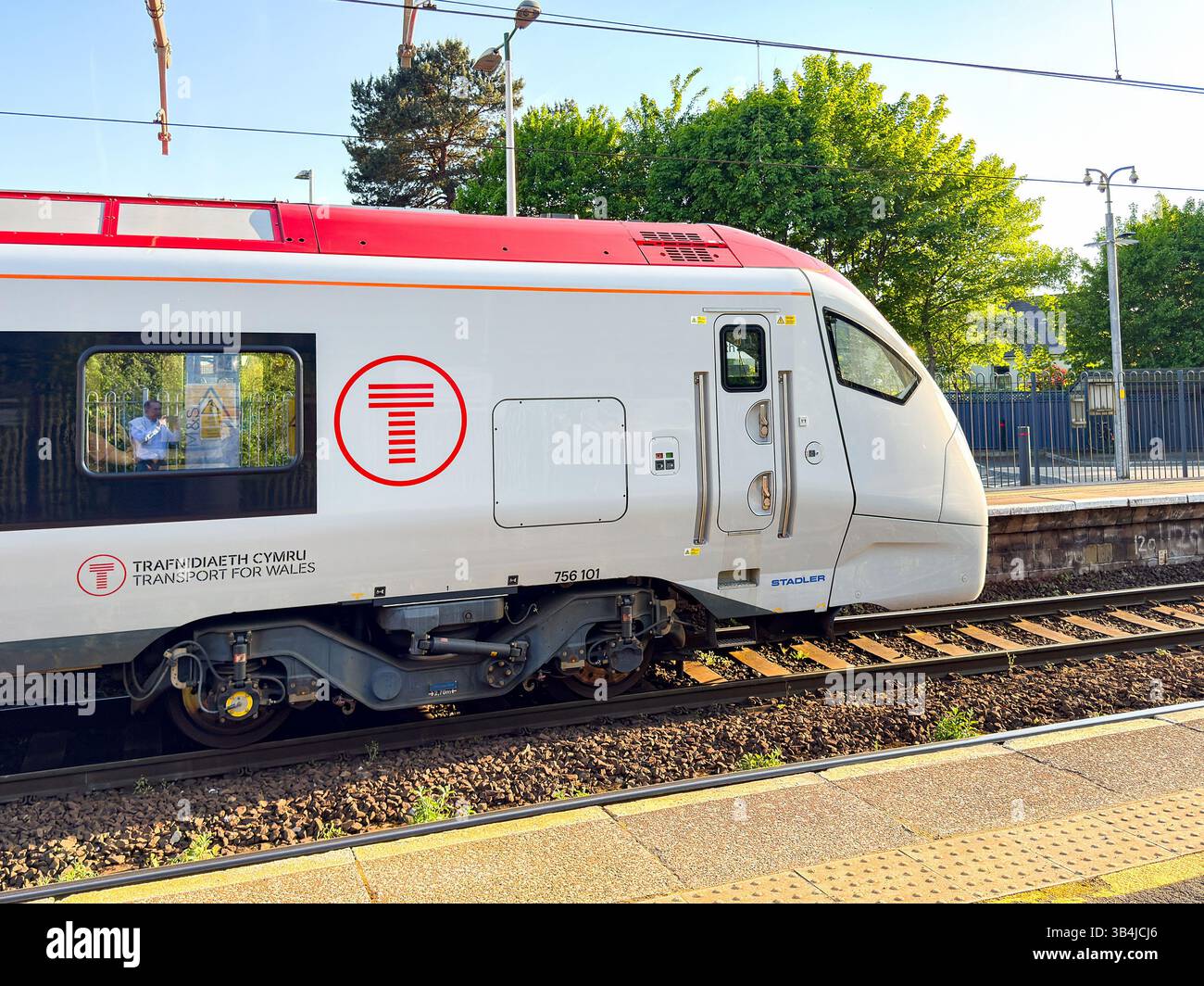 Cardiff, Wales, UK - 29 April 2025: Class 756 commuter train at Llandaff North railway station. The locomotive was built for Transport for Wales. - Smartphone Captured Stock Image
