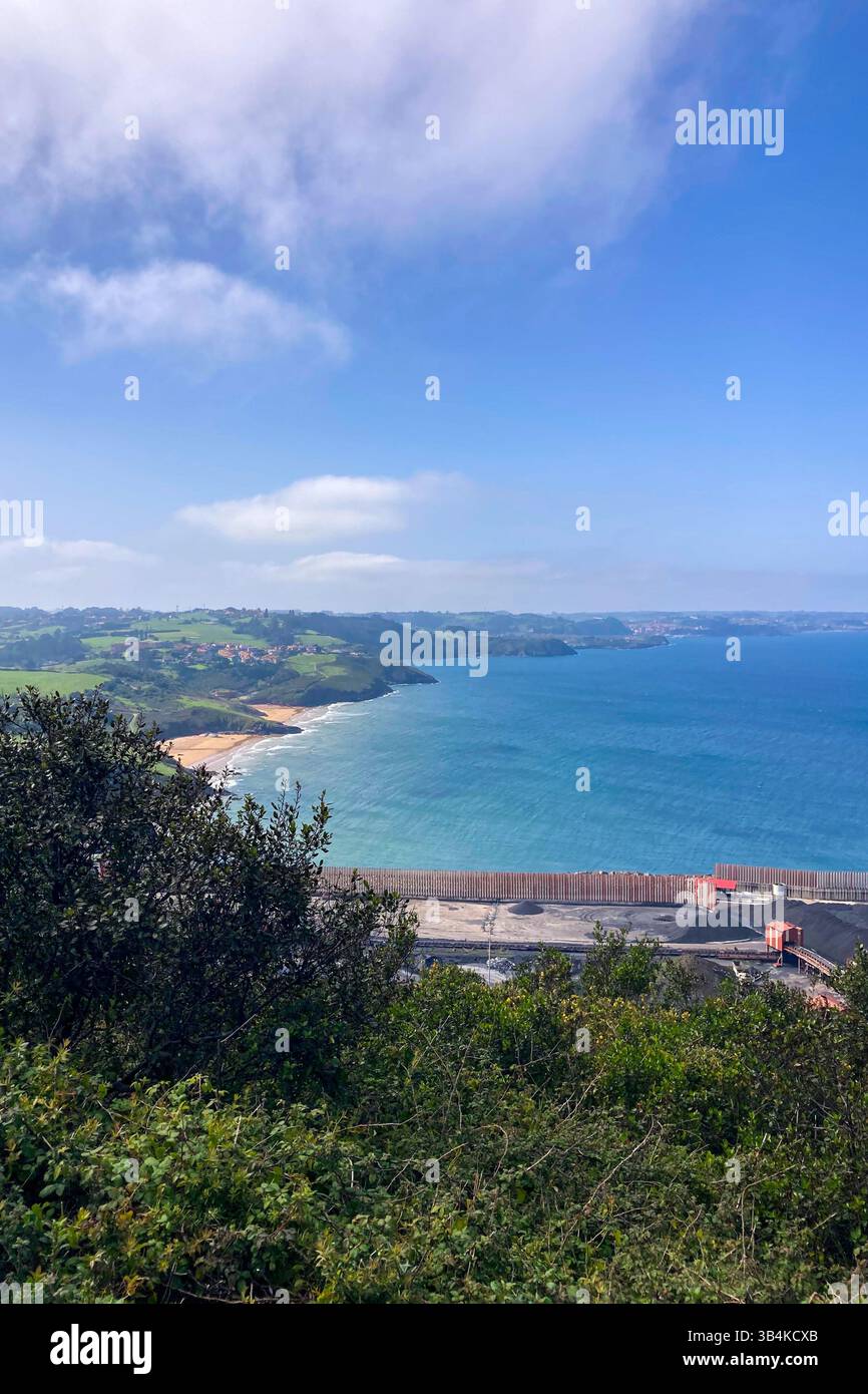 GIJON, SPAIN - APRIL  7, 2025: Gijón port settlements amidst scenic coastal landscapes in Gijón, Asturias, Spain - Smartphone Captured Stock Image