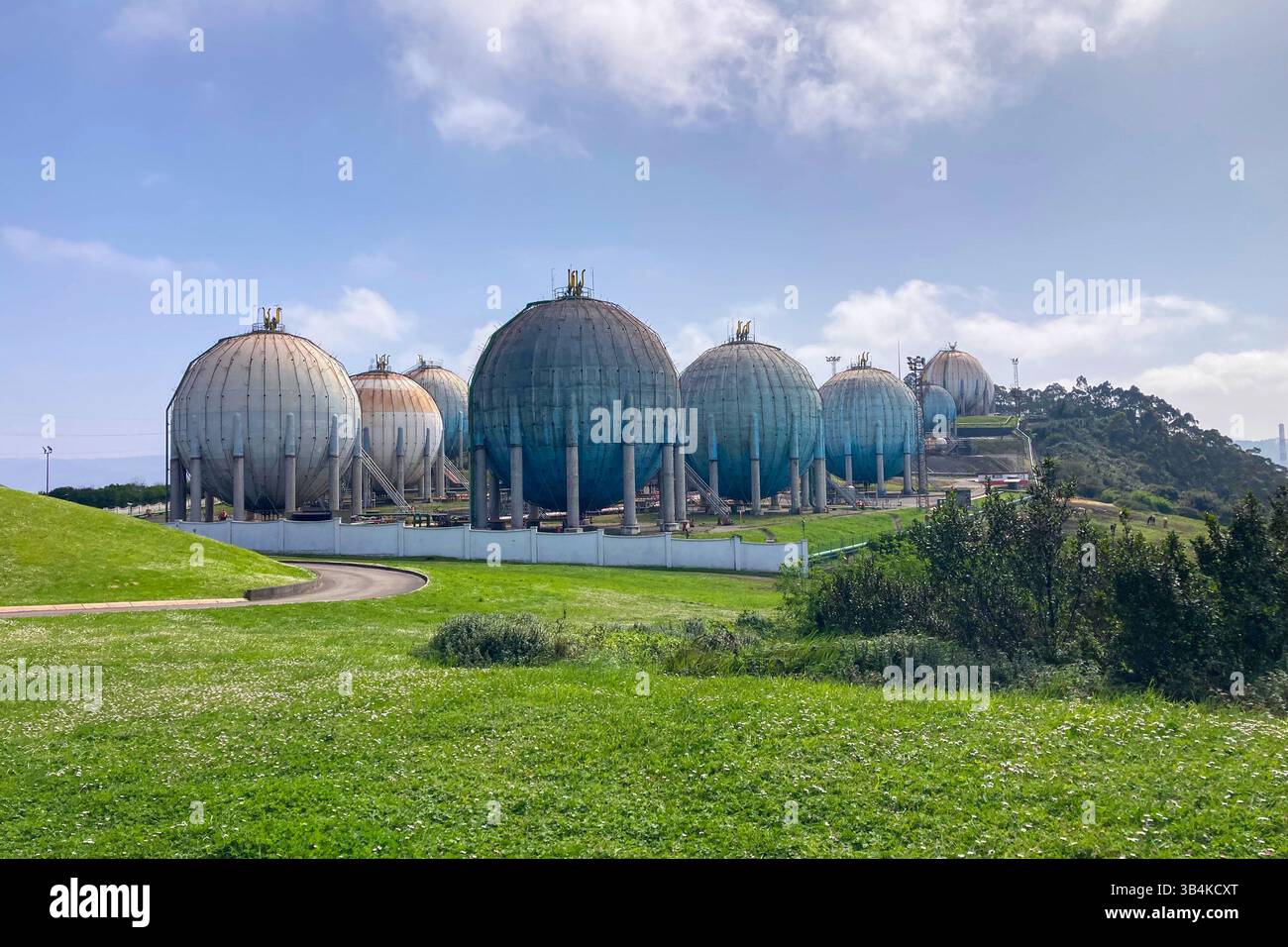 GIJON, SPAIN - APRIL  7, 2025: The futuristic design of the Repsol gas station in Gijón, Asturias, Spain, resembles a scene from a Star Wars movie. - Smartphone Captured Stock Image