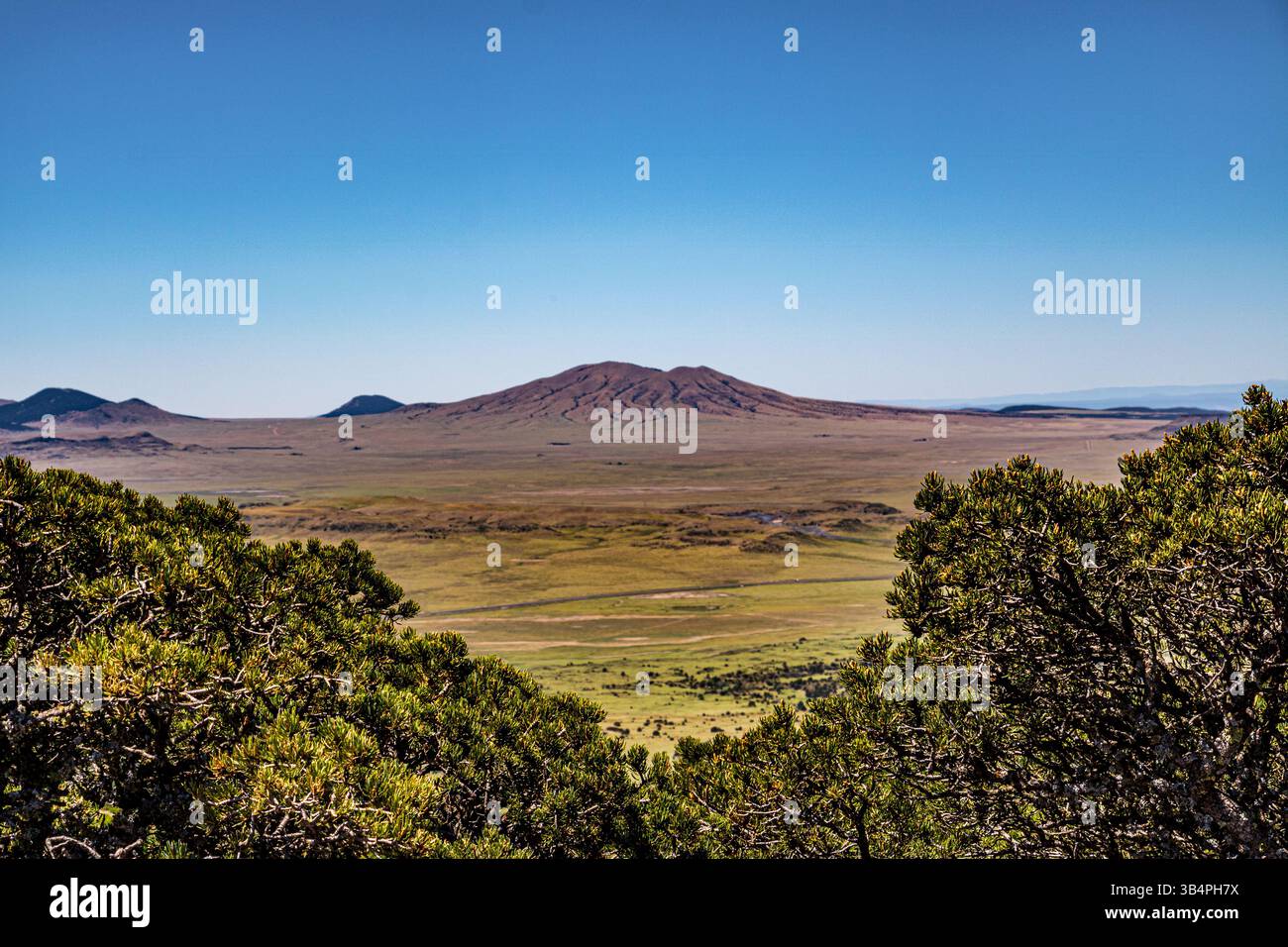 Serene landscape of the volcanic field seen from Crater Rim Trail at ...