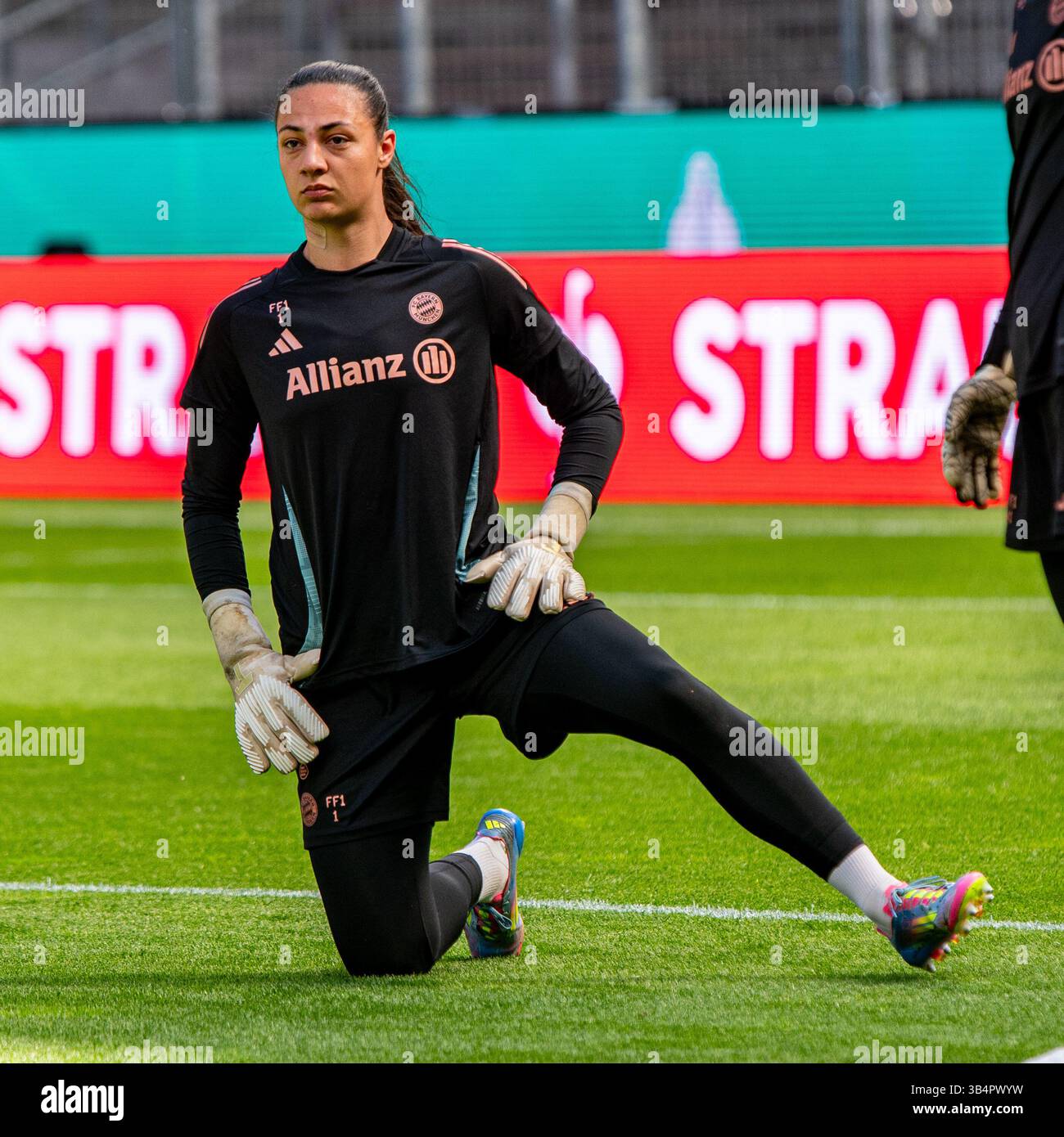 Cologne, North Rhine-Westphalia, Germany. 30th Apr, 2025. FC Bayern Munich goalkeeper MARIA LUISA GROHS (1) stretches during the FC Bayern Munich practice the day before the Women's DFB Cup final in the RheinEnergieStadion in Cologne, Germany on April 30, 2025. (Credit Image: © Kai Dambach/ZUMA Press Wire) EDITORIAL USAGE ONLY! Not for Commercial USAGE! Stock Photo