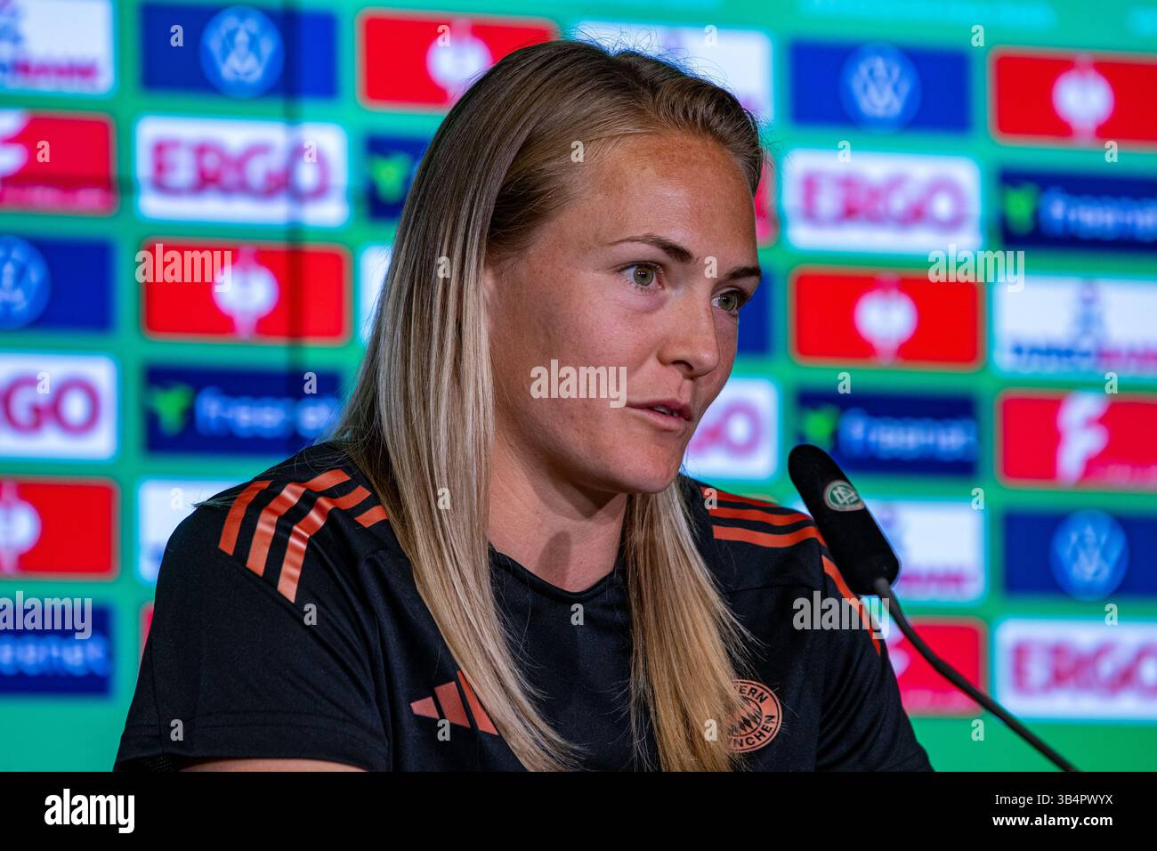 Cologne, North Rhine-Westphalia, Germany. 30th Apr, 2025. FC Bayern Munich captain MAGDALENA ERIKSSON (5) answers a question during the press conference the day before the Women's DFB Cup final in the RheinEnergieStadion in Cologne, Germany on April 30, 2025. (Credit Image: © Kai Dambach/ZUMA Press Wire) EDITORIAL USAGE ONLY! Not for Commercial USAGE! Stock Photo
