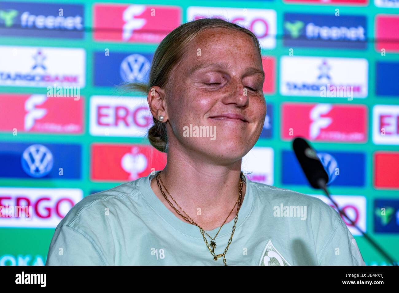Cologne, North Rhine-Westphalia, Germany. 30th Apr, 2025. SV Werder Bremen captain LINA HAUSICKE (18) smiles during the press conference the day before the Women's DFB Cup final in the RheinEnergieStadion in Cologne, Germany on April 30, 2025. (Credit Image: © Kai Dambach/ZUMA Press Wire) EDITORIAL USAGE ONLY! Not for Commercial USAGE! Stock Photo