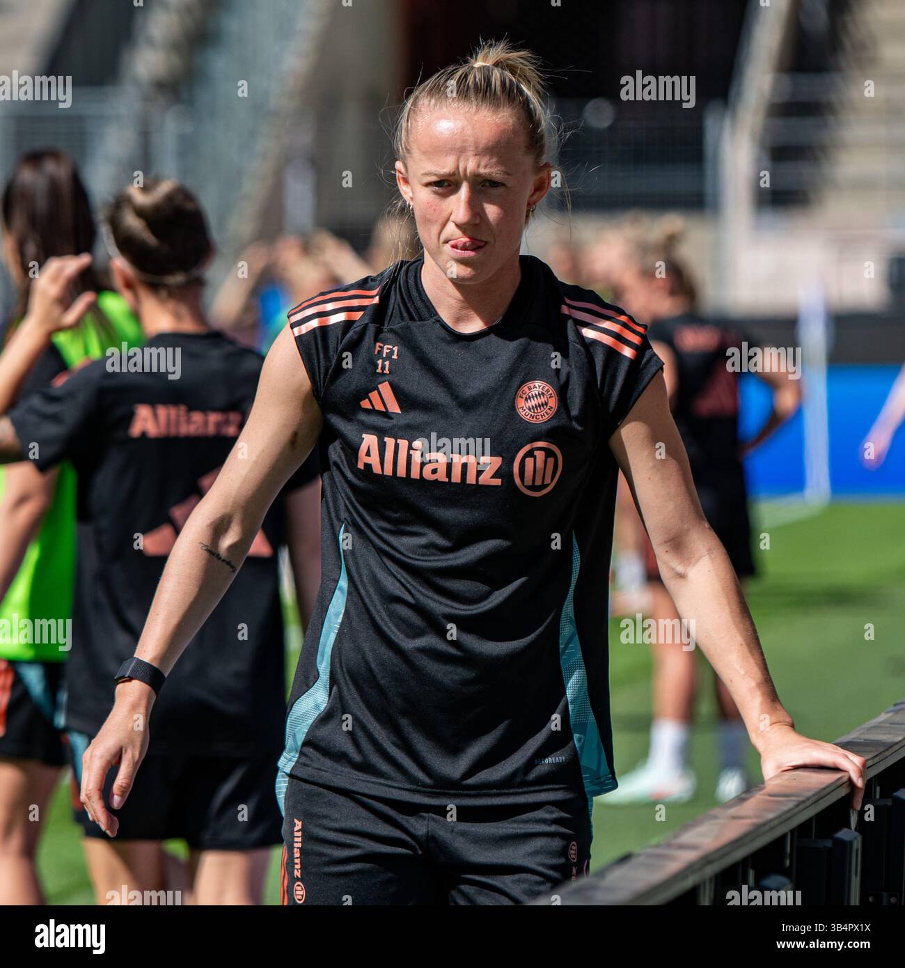 Cologne, North Rhine-Westphalia, Germany. 30th Apr, 2025. FC Bayern Munich forward LEA SCHULLER (11, front) warms up during the FC Bayern Munich practice the day before the Women's DFB Cup final in the RheinEnergieStadion in Cologne, Germany on April 30, 2025. (Credit Image: © Kai Dambach/ZUMA Press Wire) EDITORIAL USAGE ONLY! Not for Commercial USAGE! Stock Photo
