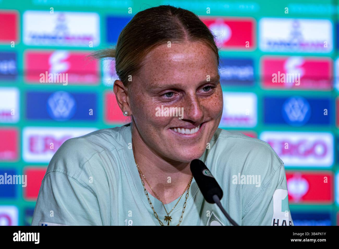 Cologne, North Rhine-Westphalia, Germany. 30th Apr, 2025. SV Werder Bremen captain LINA HAUSICKE (18) answers a question during the press conference the day before the Women's DFB Cup final in the RheinEnergieStadion in Cologne, Germany on April 30, 2025. (Credit Image: © Kai Dambach/ZUMA Press Wire) EDITORIAL USAGE ONLY! Not for Commercial USAGE! Stock Photo