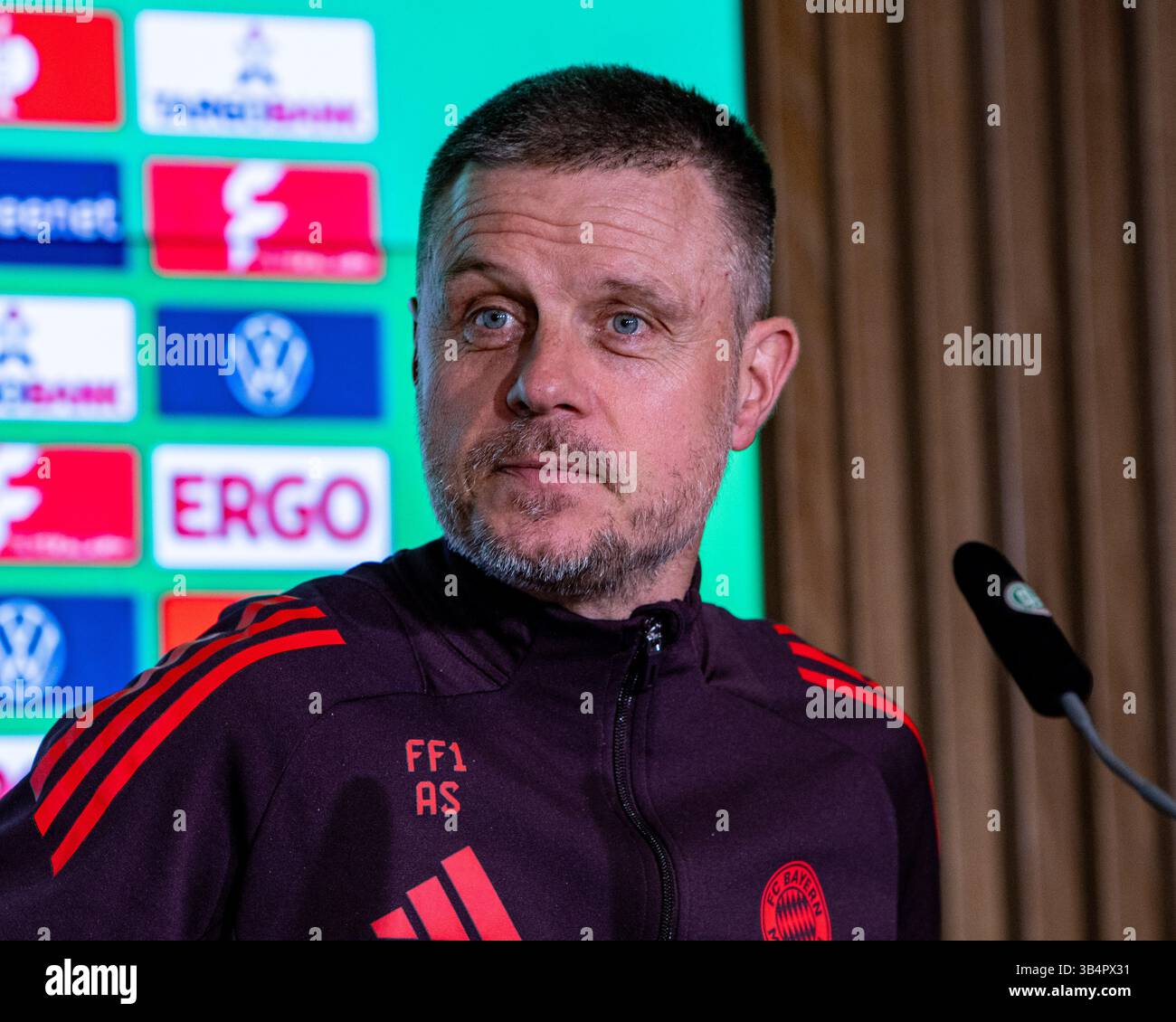 Cologne, North Rhine-Westphalia, Germany. 30th Apr, 2025. FC Bayern Munich head coach ALEXANDER STRAUS sits down for the press conference the day before the Women's DFB Cup final in the RheinEnergieStadion in Cologne, Germany on April 30, 2025. (Credit Image: © Kai Dambach/ZUMA Press Wire) EDITORIAL USAGE ONLY! Not for Commercial USAGE! Stock Photo