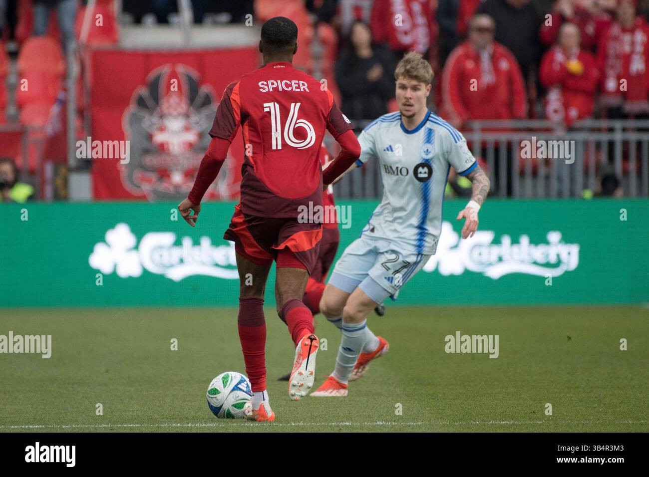 Toronto, Canada. 30th Apr, 2025. Tyrese Spicer #16 (L) and Dawid Bugaj