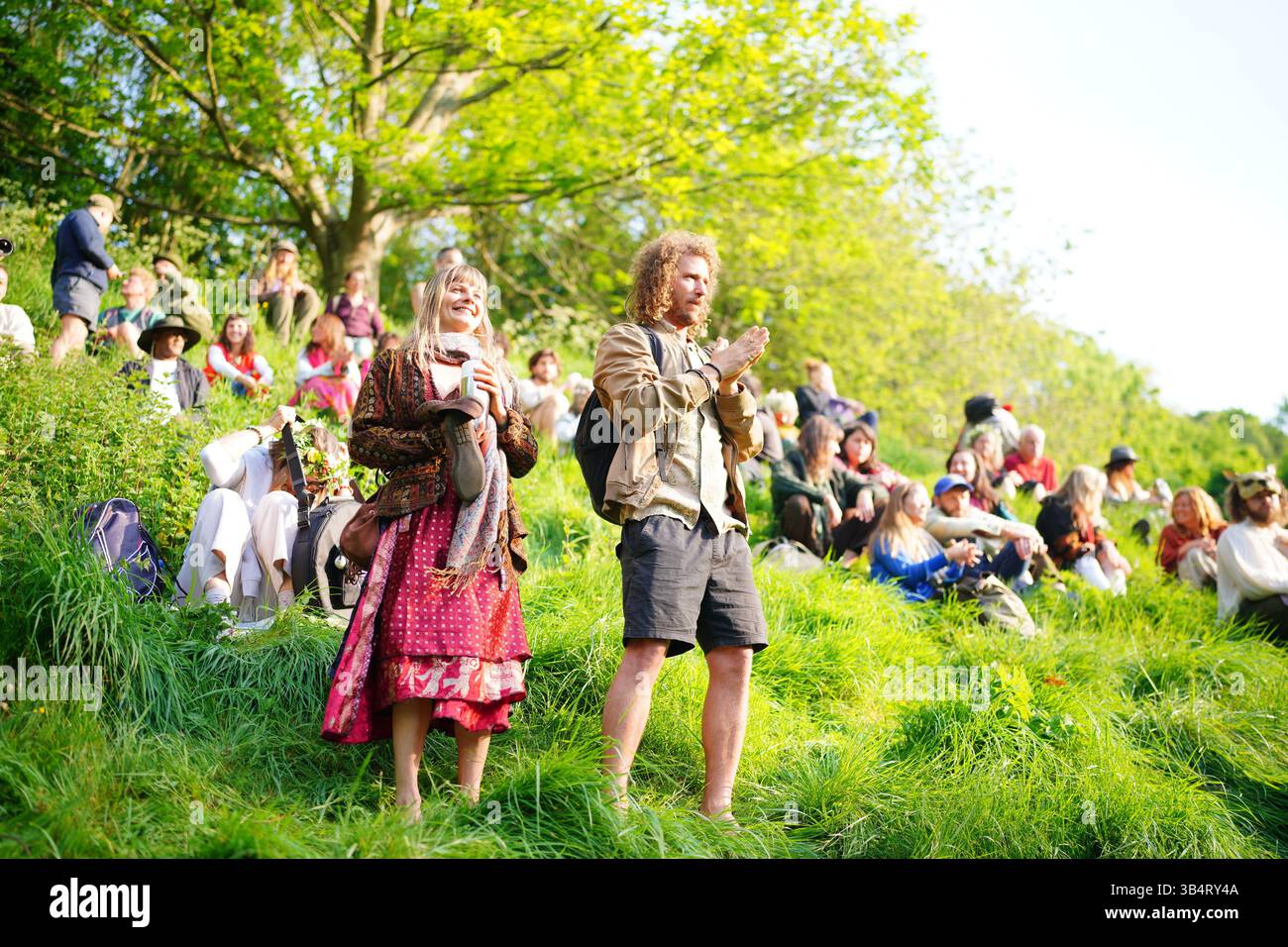 People during the Beltane celebrations at Glastonbury Chalice Well ...