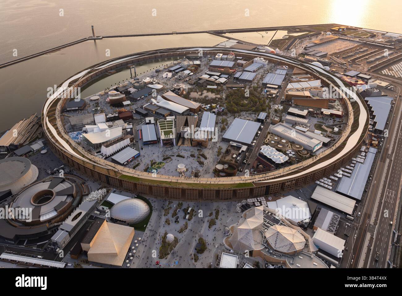 Aerial view of Osaka Expo 2025 Japan, helicopter view sunset