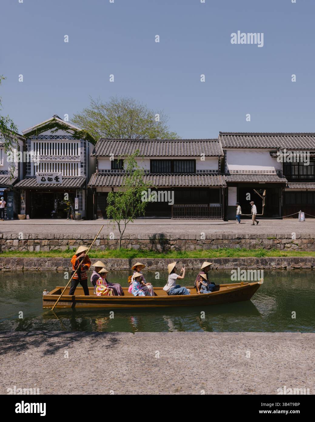 Kurashiki Bikan Historical Quarter canal view with boats Stock Photo ...