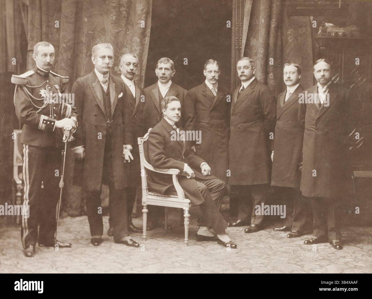 This photograph shows King Manuel II of Portugal with his peers during his 1909 visit to Paris. The image reflects early 20th-century royal representation and the historical context of the Portuguese monarchy. Stock Photo