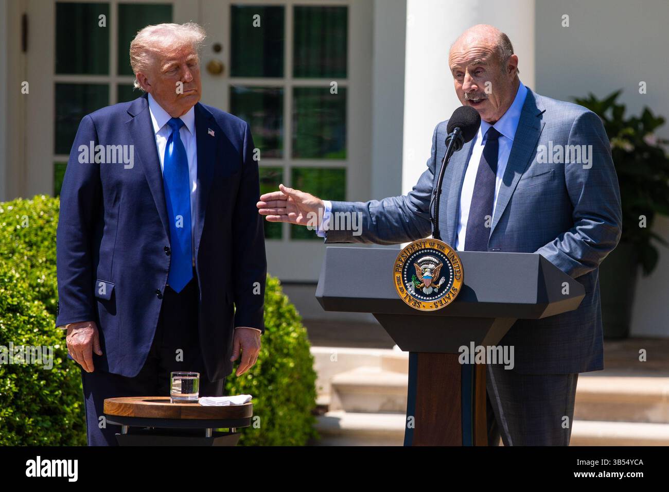 President Donald Trump is joined by TV personality Dr. Phil McGraw ...