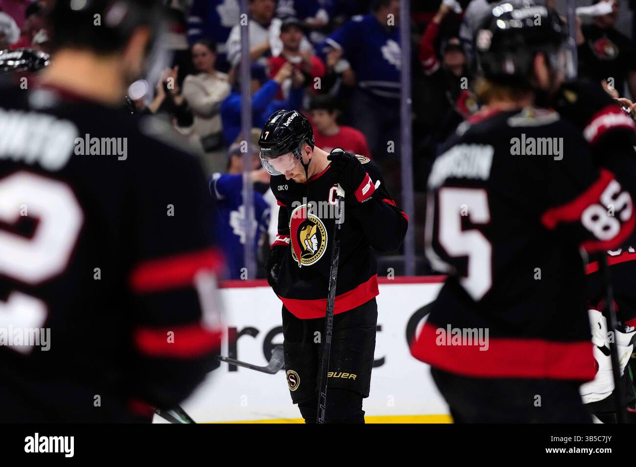 Ottawa Senators' Brady Tkachuk (7) looks at the ice after his team's ...