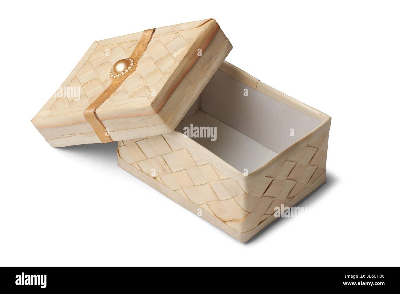 opened small rectangular storage box crafted from woven rattan isolated white background, charming and functional natural light beige color empty Stock Photo