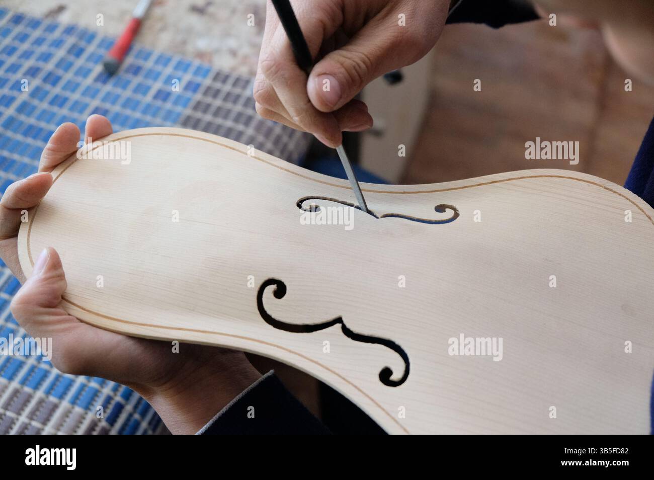 String Instruments Being Made Production of various musical instruments in the workshop Stock Photo ...