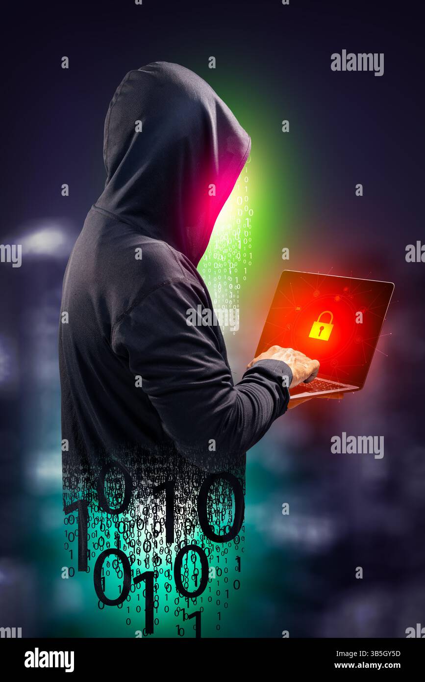 Faceless hackers and malware hackers use laptops with dangerous digital code on binary code background. Stock Photo