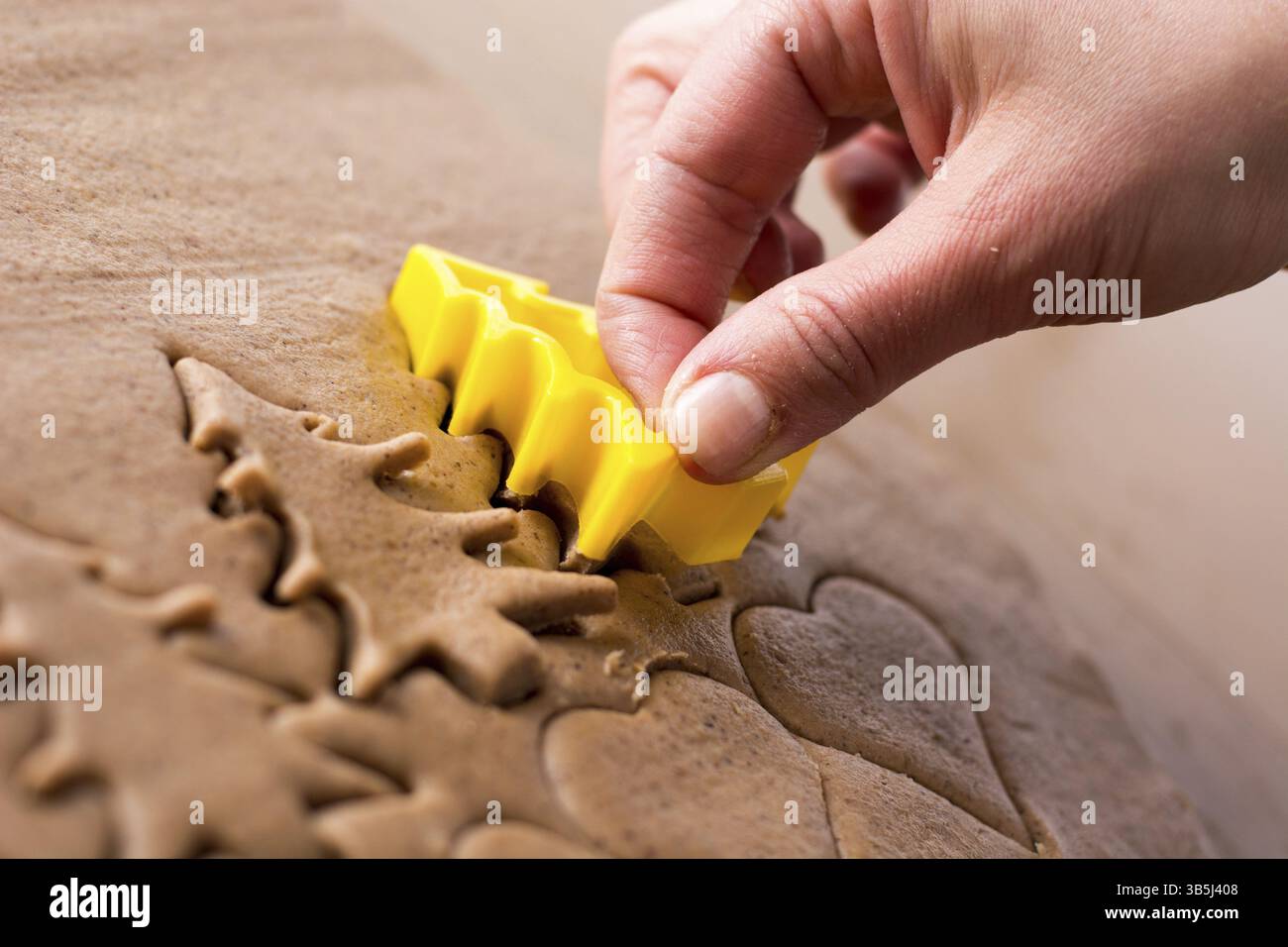 Preparing easter gingerbread cookies. Steps of making pastry Stock Photo