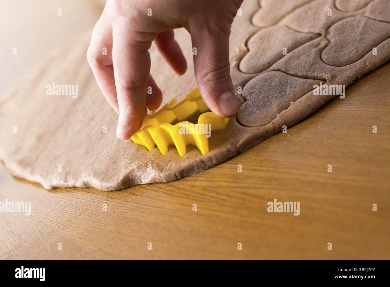 Preparing easter gingerbread cookies. Steps of making pastry Stock Photo