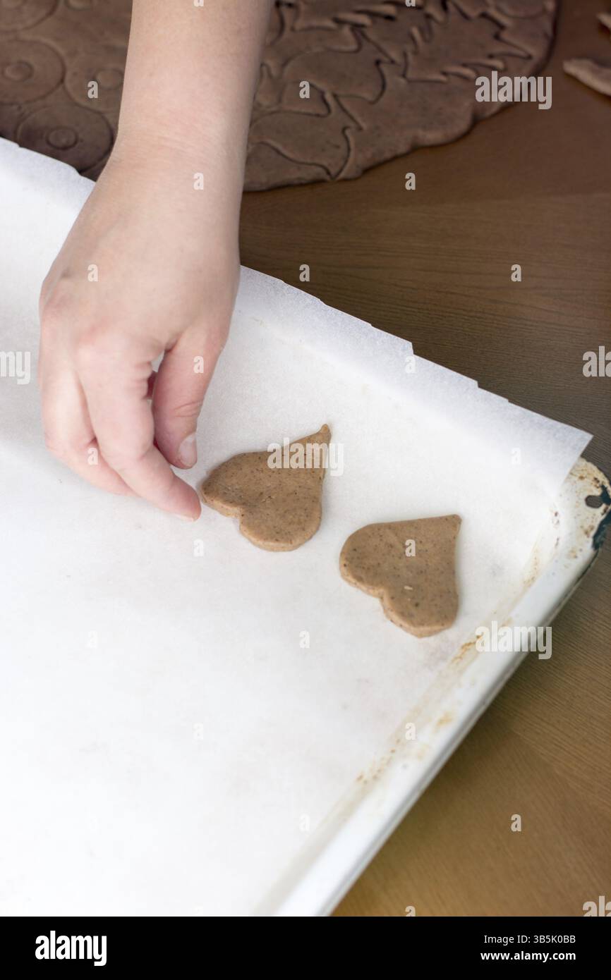 Preparing easter gingerbread cookies. Steps of making pastry Stock Photo