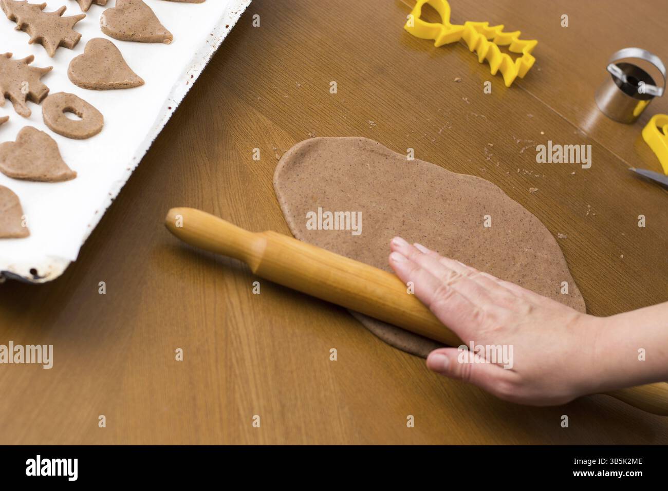 Preparing easter gingerbread cookies. Steps of making pastry Stock Photo