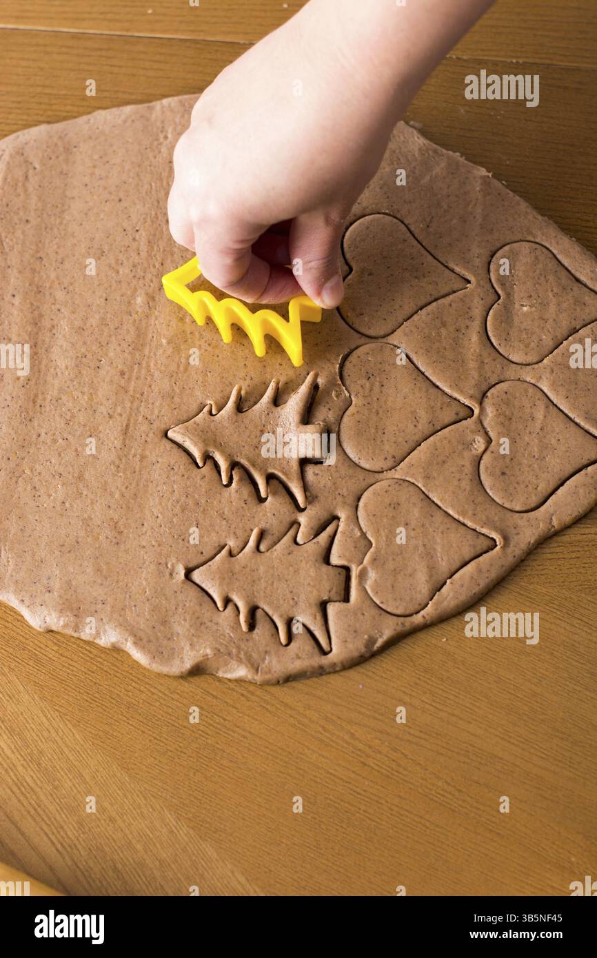 Preparing easter gingerbread cookies. Steps of making pastry Stock Photo