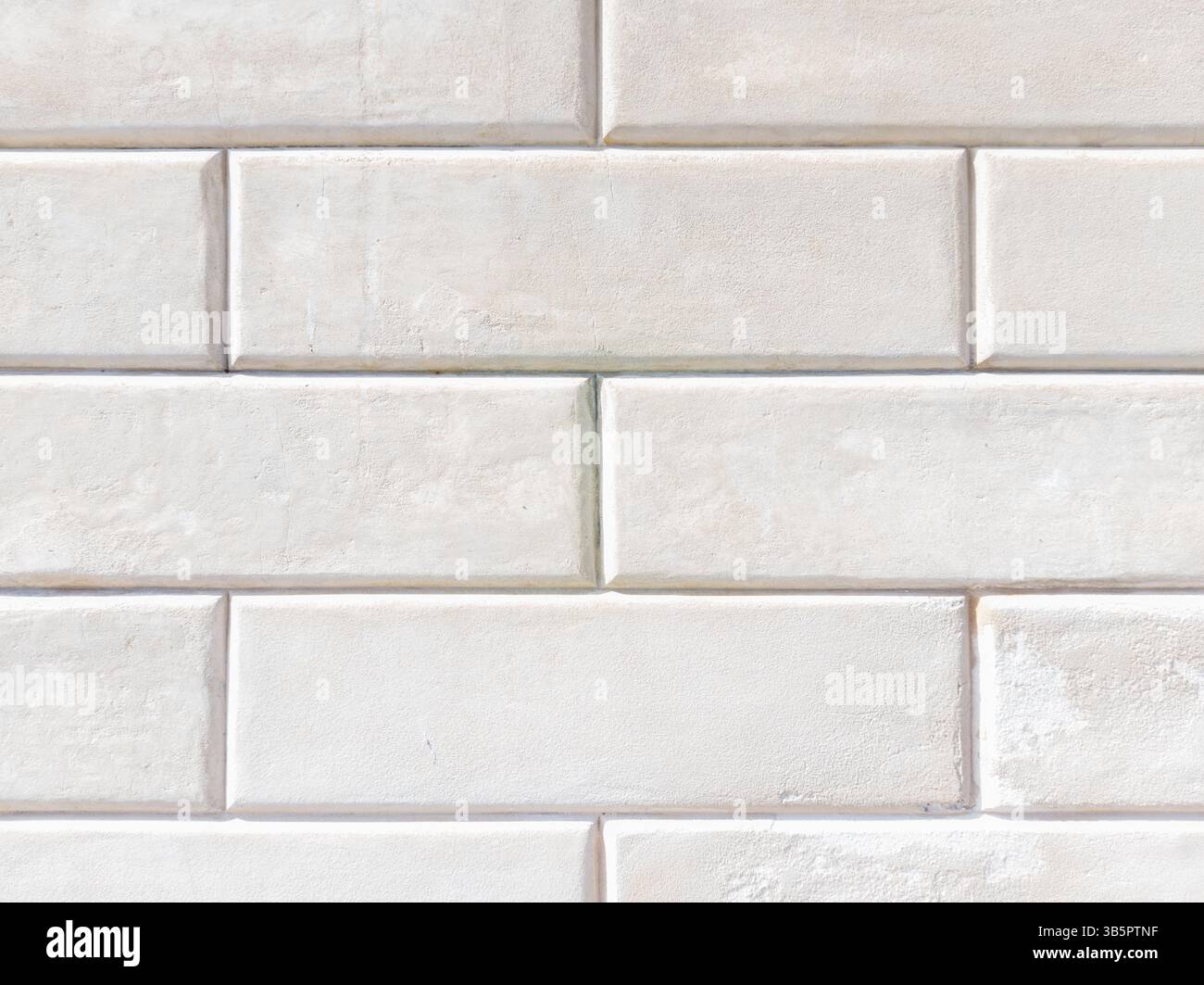 White Stone Wall with Rectangular Blocks Texture Stock Photo