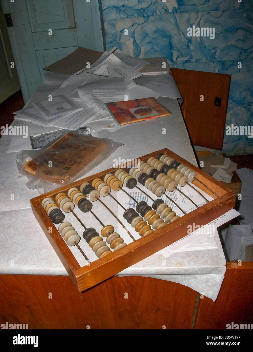 Wooden bills. Ancient counting tool on the table Stock Photo