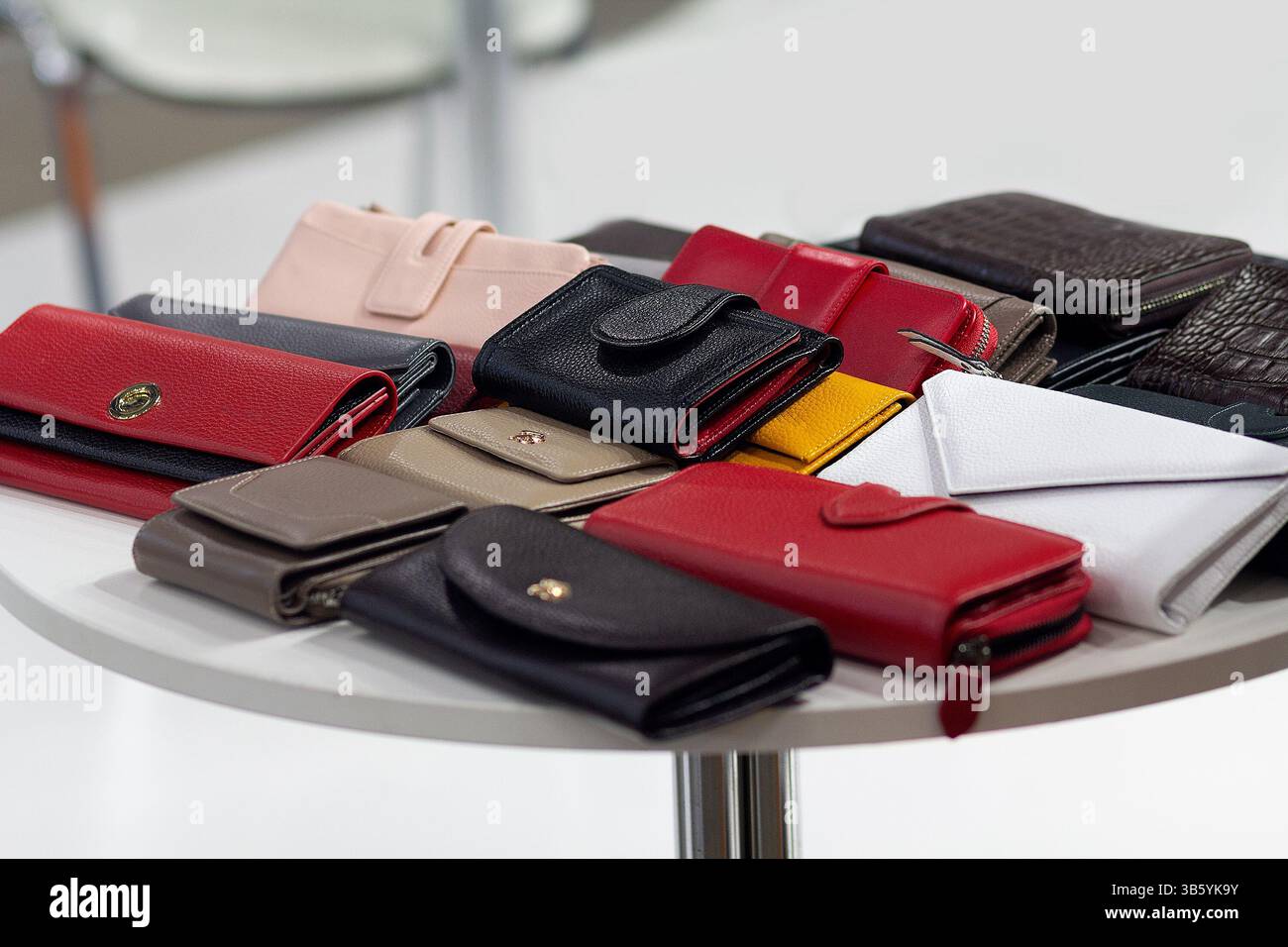 Genuine leather wallets on a store window, Sale Stock Photo