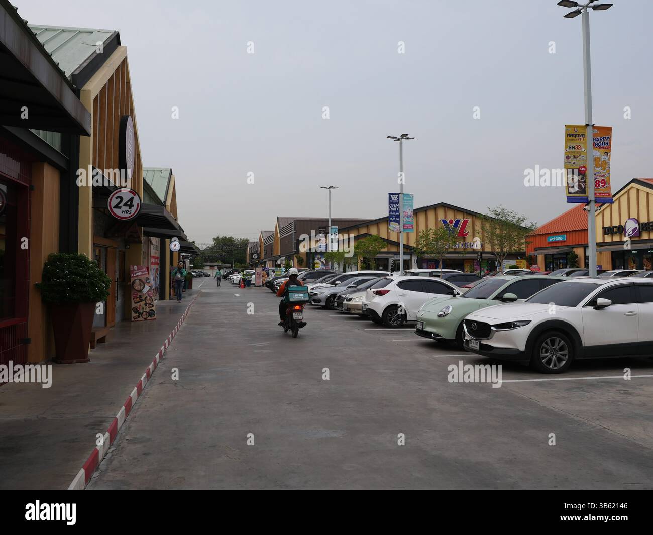 A mini mall on Srinagarindra-Romklao Road in Bangkok, Thailand. These ...