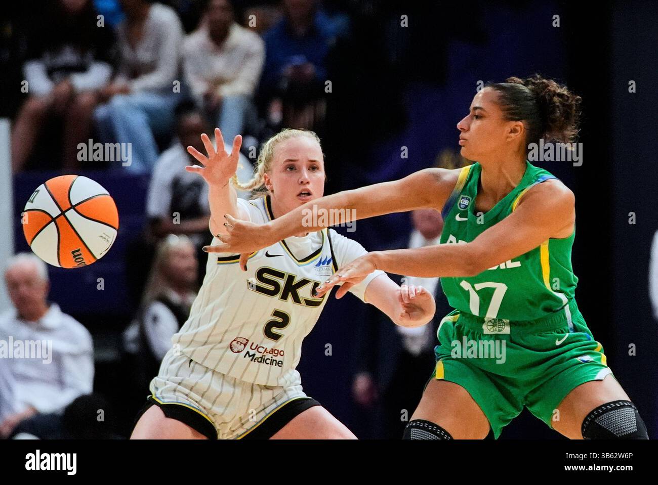 Hailey Guard Brazil forward Carina Martins (17) passes around Chicago Sky guard ...