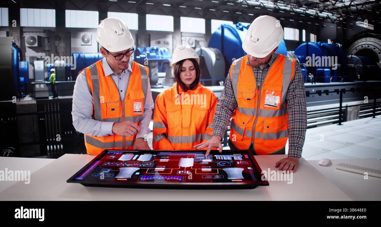 Electricity Generation In Power Plant Controlled By Man Using SCADA. Stock Photo